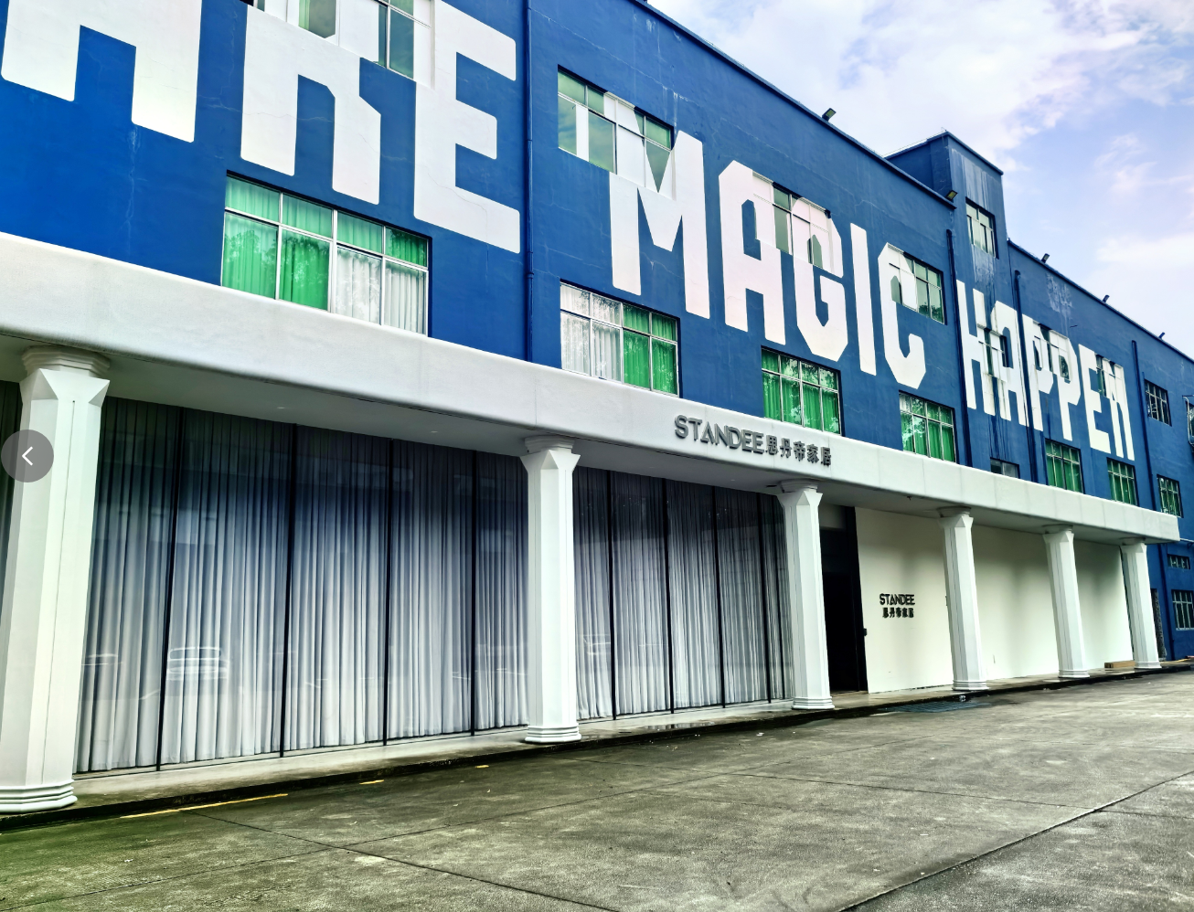 Angled view of the STANDEE furniture manufacturing building